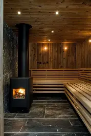 Warm timber-lined Nordic sauna with wood-burning stove